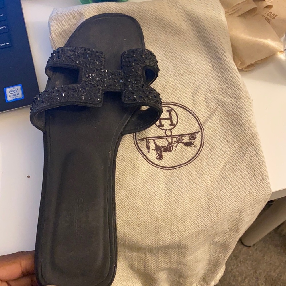 Black studded Hermes sandals